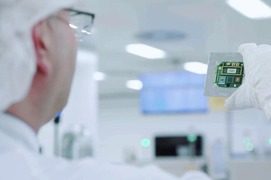 Man looks at MST product in lab 